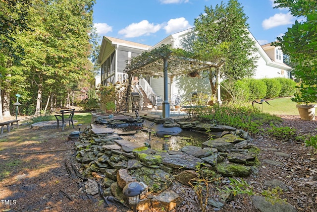 view of yard featuring a patio and a pergola