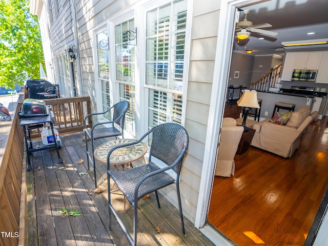 deck featuring a grill