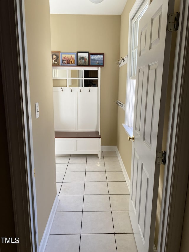 mudroom with light tile patterned floors