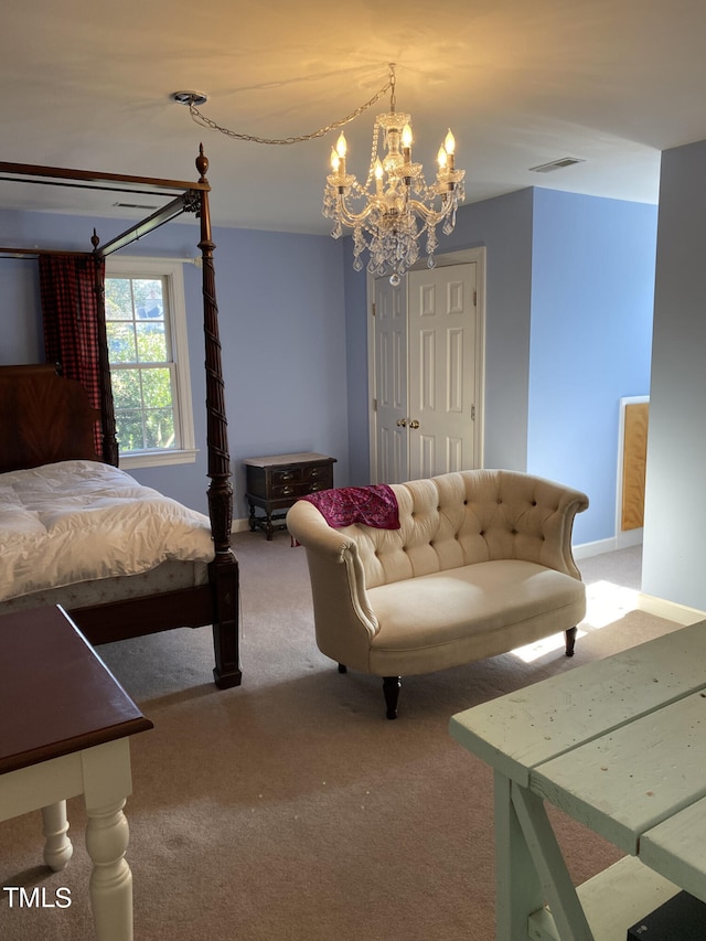 carpeted bedroom with a notable chandelier