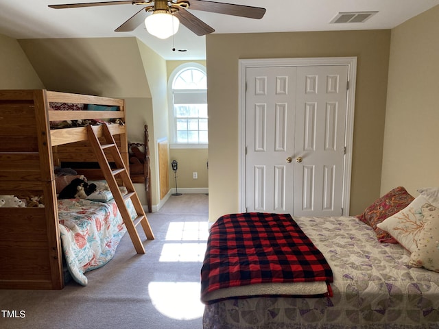 carpeted bedroom featuring ceiling fan