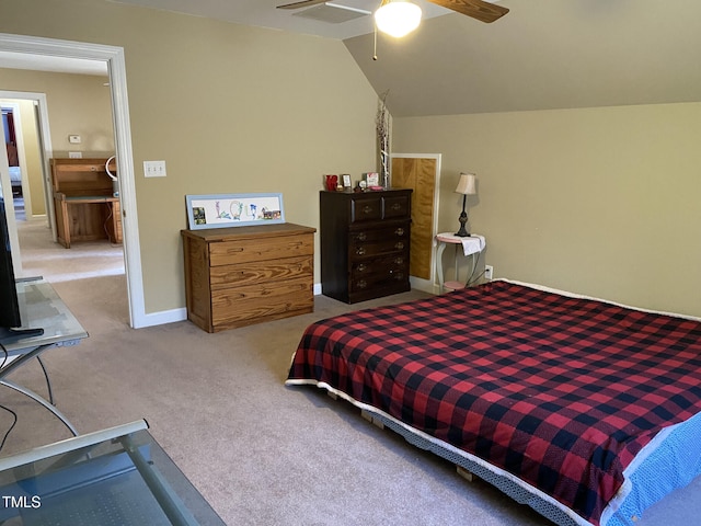 carpeted bedroom with lofted ceiling and ceiling fan