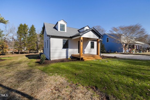 view of front of home with a front lawn