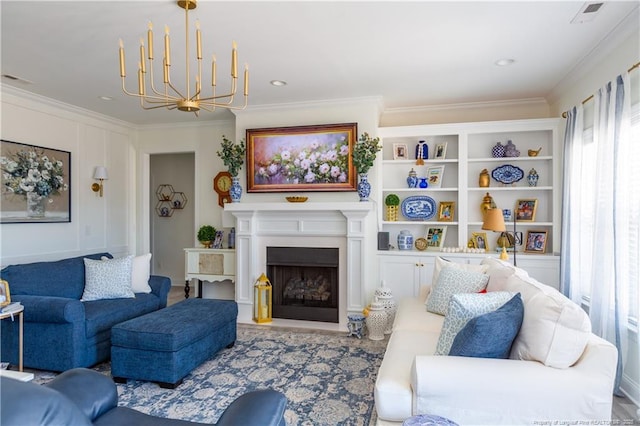 living room featuring crown molding and a notable chandelier