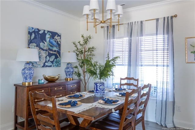 dining space featuring a notable chandelier and ornamental molding