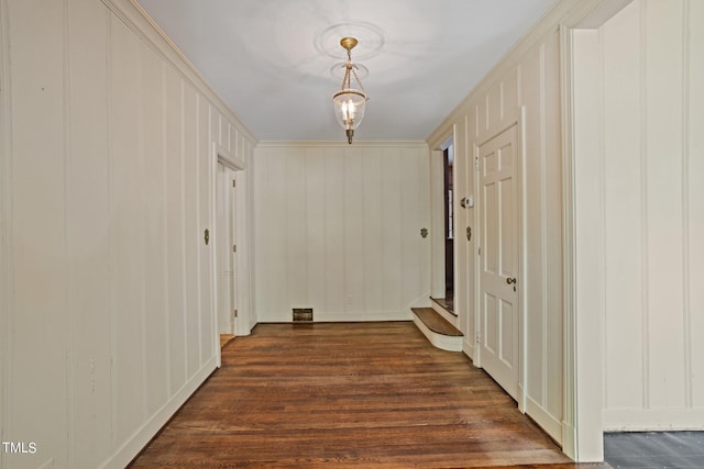 hall with dark hardwood / wood-style floors