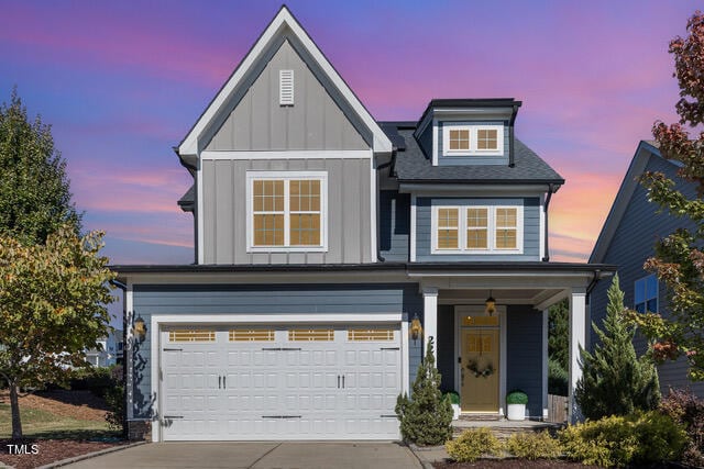 view of front of property featuring a garage