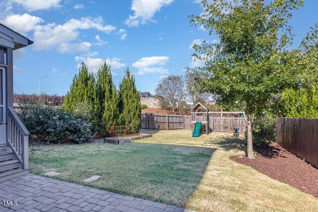 view of yard featuring a playground