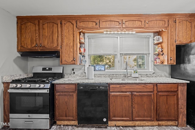 kitchen featuring sink, black appliances, and light stone countertops