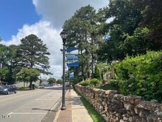 1036 S Fieldhaven Dr, Fuquay Varina, NC 27526 - view of asphalt street featuring sidewalks and curbs