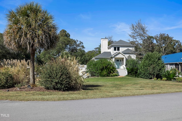 view of front of house with a front yard