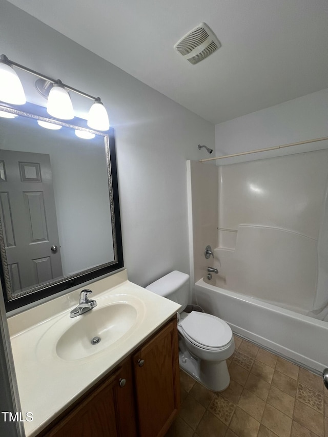 full bathroom with vanity, shower / bathtub combination, and toilet