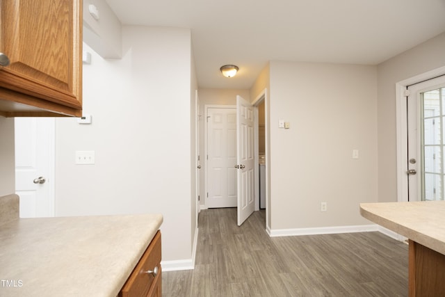 kitchen with hardwood / wood-style flooring