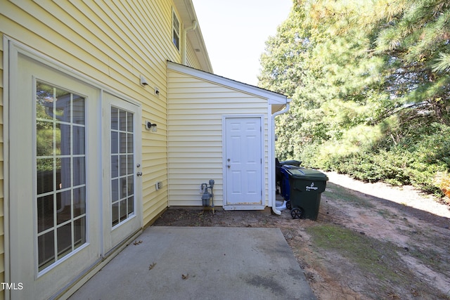 doorway to property with a patio area