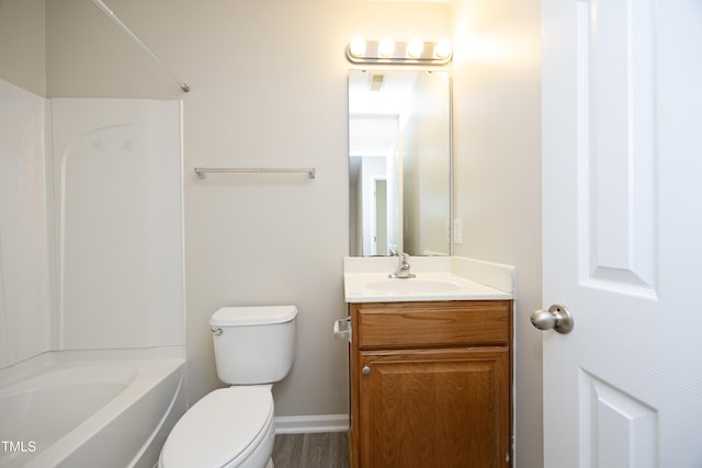 full bathroom featuring vanity, toilet, and shower / washtub combination