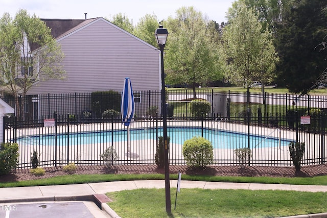 view of pool featuring a patio