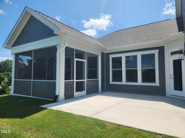 1230 Linkwood, Home, Fuquay Varina, NC 27526 - rear view of house with a sunroom, a patio area, roof with shingles, and a yard