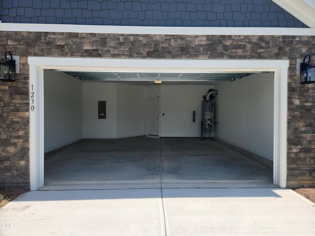 1230 Linkwood, Home, Fuquay Varina, NC 27526 - garage featuring electric panel, driveway, and gas water heater