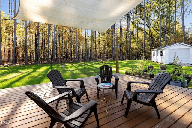 wooden terrace featuring a storage shed and a yard