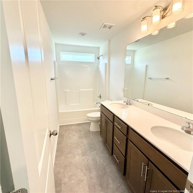 145 Cahill, Home, Raeford, NC 28376 - bathroom featuring shower / bath combination, double vanity, and toilet