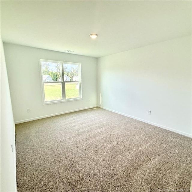 145 Cahill, Home, Raeford, NC 28376 - empty room featuring carpet and baseboards