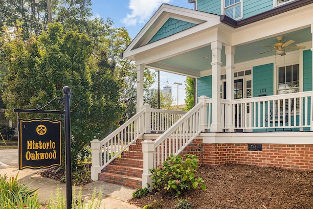 property entrance with a porch and ceiling fan