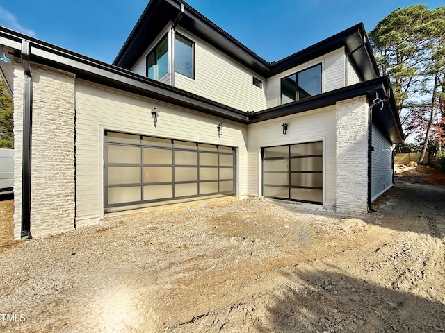 exterior space with a garage