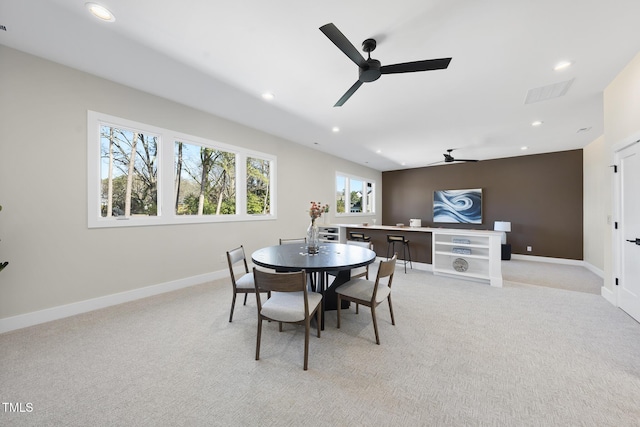 dining space with recessed lighting, light carpet, ceiling fan, and baseboards