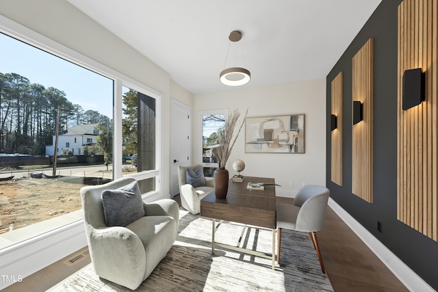 sunroom featuring visible vents