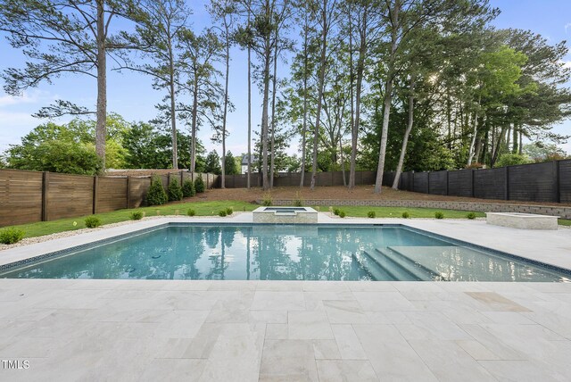 662 Manchester Dr, Raleigh, NC 27609 - view of pool featuring an in-ground hot tub, a fenced backyard, and a patio