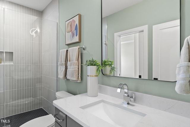 662 Manchester Dr, Raleigh, NC 27609 - full bath with toilet, vanity, and tiled shower