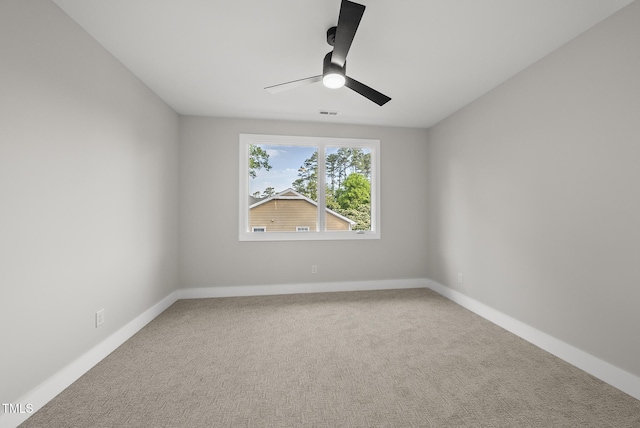 662 Manchester Dr, Raleigh, NC 27609 - carpeted empty room featuring a ceiling fan and baseboards