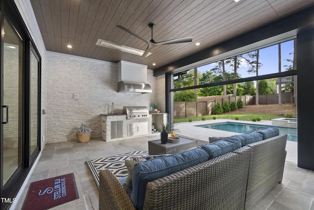662 Manchester Dr, Raleigh, NC 27609 - view of patio featuring an outdoor kitchen, grilling area, a fenced backyard, an outdoor hangout area, and a sink