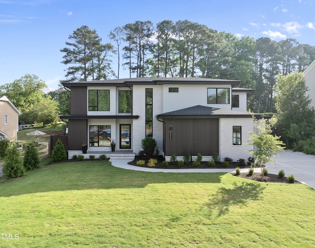 662 Manchester Dr, Raleigh, NC 27609 - view of front of home featuring a front yard