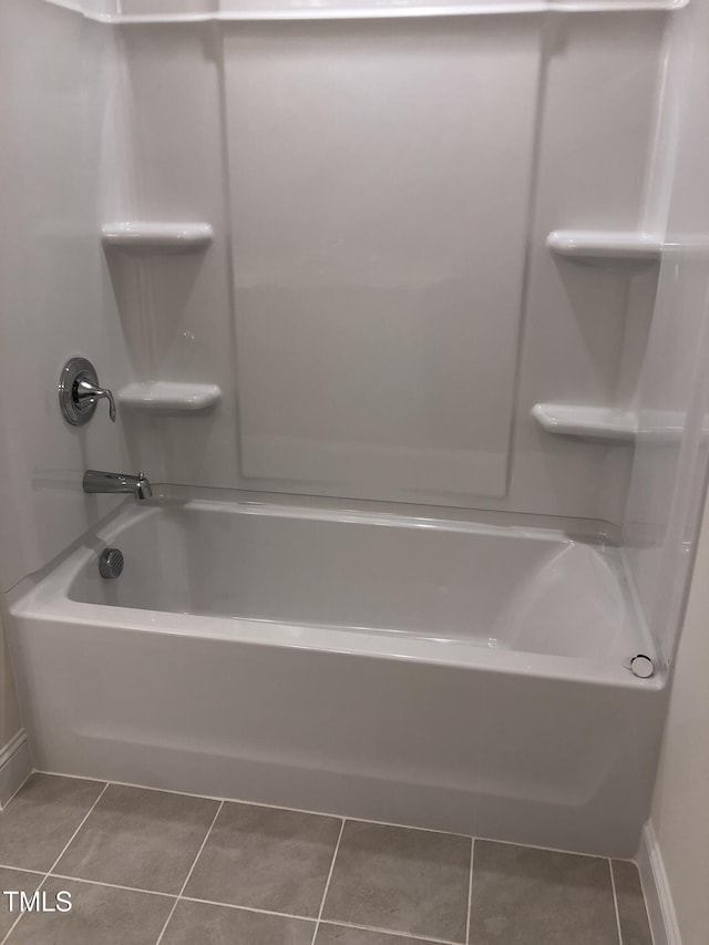 full bathroom with tile patterned flooring and shower / washtub combination