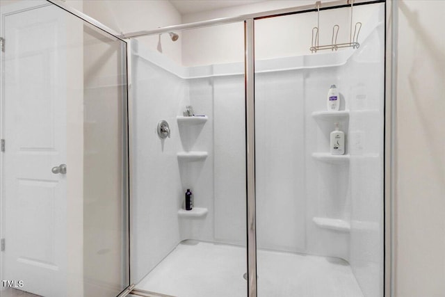 bathroom featuring an enclosed shower