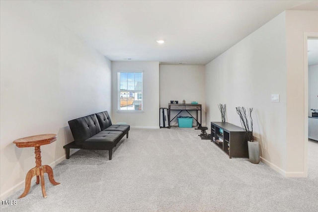 sitting room with light carpet