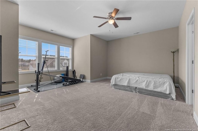bedroom featuring visible vents, a ceiling fan, carpet flooring, and baseboards