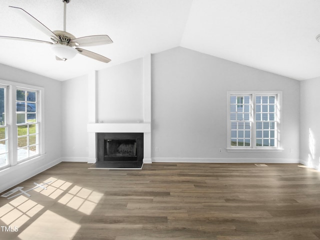 unfurnished living room with lofted ceiling, ceiling fan, and dark hardwood / wood-style flooring