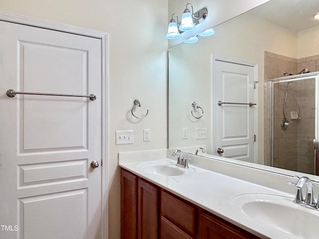 bathroom with vanity and walk in shower