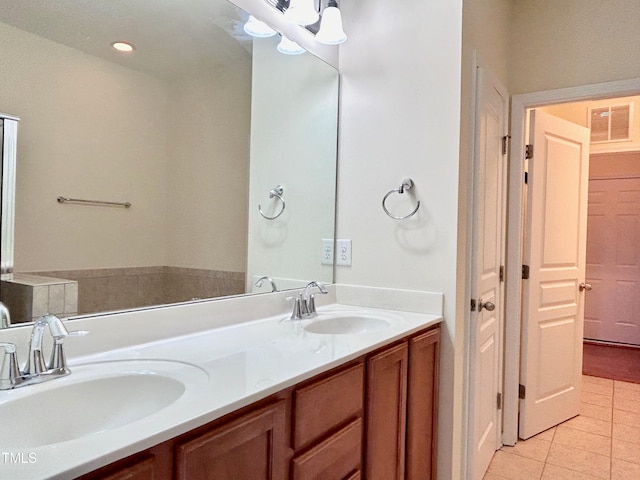 bathroom featuring vanity and tile patterned flooring