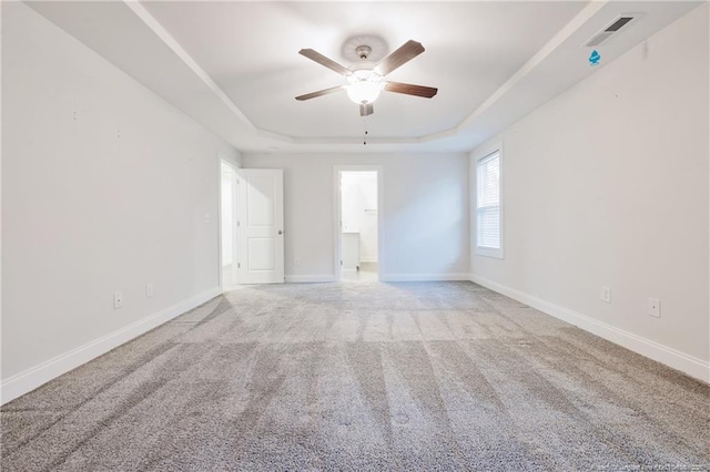 400 Jax Ct, Fayetteville, NC 28312 - carpeted empty room with a tray ceiling, ceiling fan, and baseboards