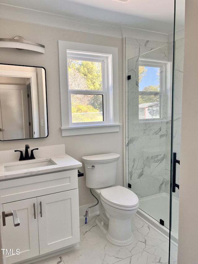 full bathroom with vanity, marble finish floor, a marble finish shower, and toilet