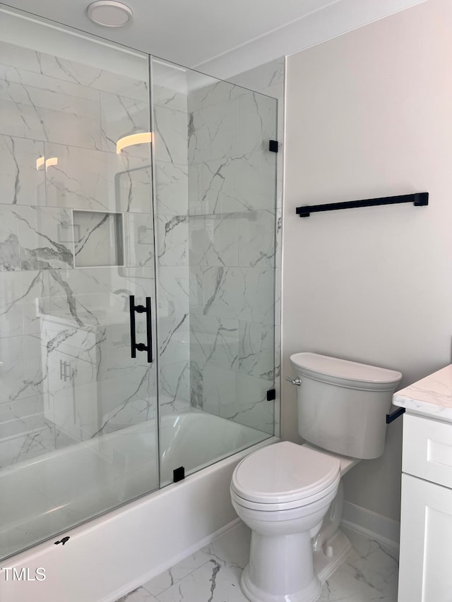 full bathroom with toilet, vanity, and shower / bath combination with glass door