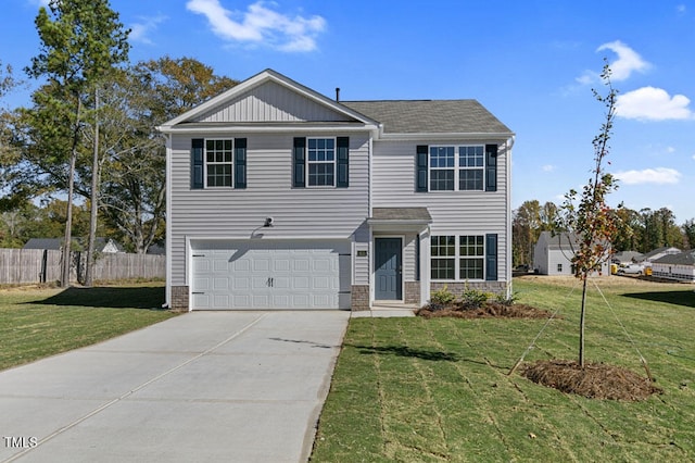 view of front facade with a front lawn and a garage