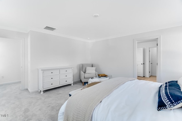 bedroom featuring baseboards, visible vents, light colored carpet, and ornamental molding