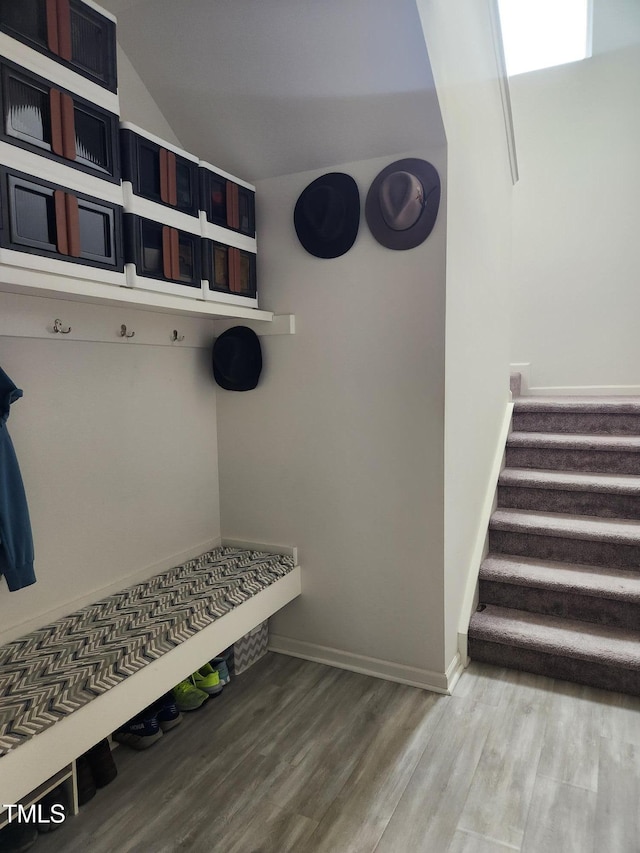 mudroom with hardwood / wood-style floors