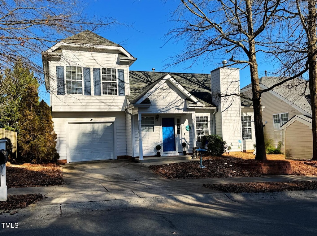 front of property with a garage