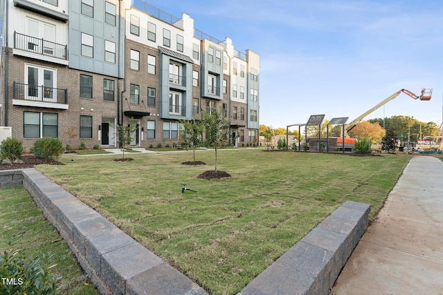 view of community with a lawn