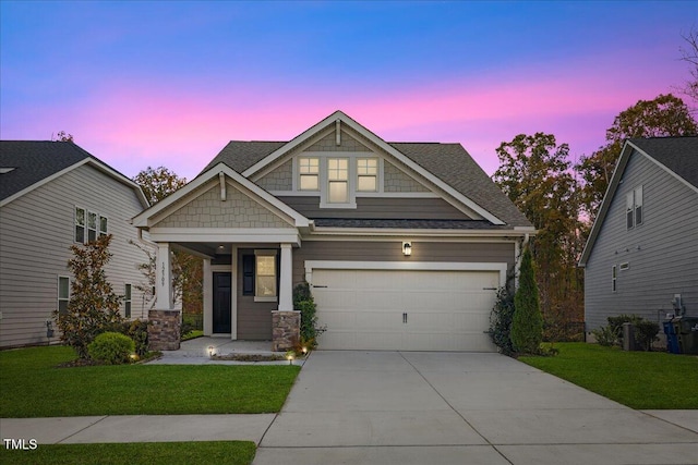 craftsman-style house featuring a yard